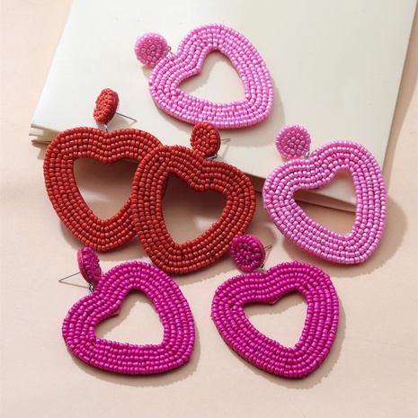 holiday color ethnic red bead hollow heart-shaped earrings's discount tags