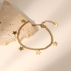 Bracelet géométrique à chaîne cubaine avec pendentif pompon étoile à cinq branches en or