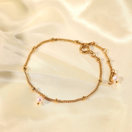 gold-plated new stainless steel thin chain with two millet beads bracelet's discount tags