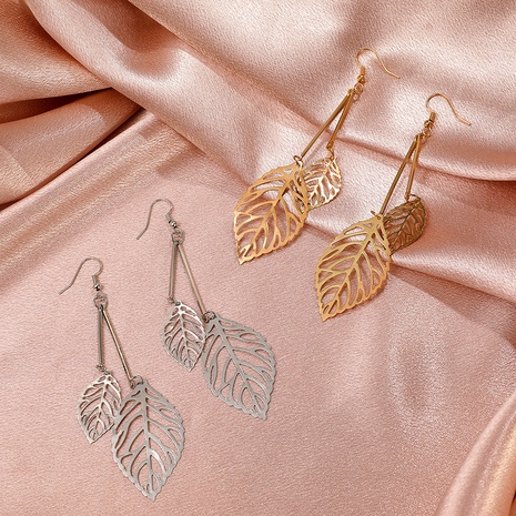 Korean temperament hollow leaf earrings exaggerated metal long tassel earrings's discount tags