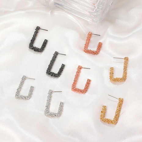 creative retro geometric personality irregular letter carved earrings's discount tags
