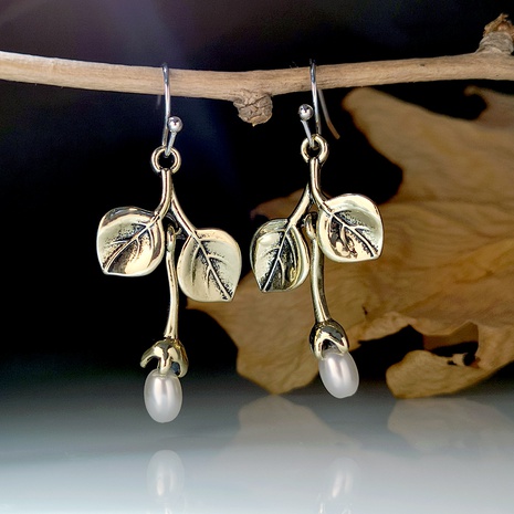 Bohemian fashion creative leaf pearl earrings's discount tags