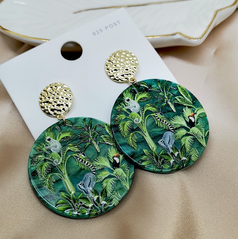 Green Rainforest Animals Plants Embossed Printed Earrings's discount tags