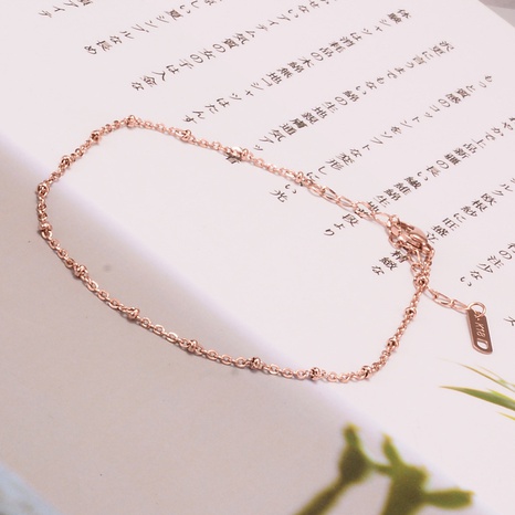 Chaîne de perles simple de mode Bracelet de cheville en acier au titane en or rose en gros's discount tags