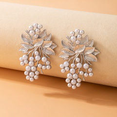 Retro ethnic geometric hollow round fashion pearl fun alloy earrings