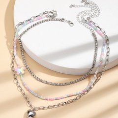 perles de couleur de mode chaîne creuse multi-pièces coeur collier en forme de papillon en gros