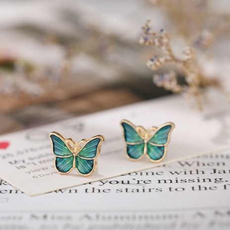 nuevos pendientes de mariposa retro simples creativos de mariposa verde oscuro's discount tags