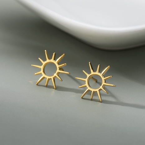Mode einfache Sonne Sonnenblume Totem geometrische hohle Kupferohrringe's discount tags