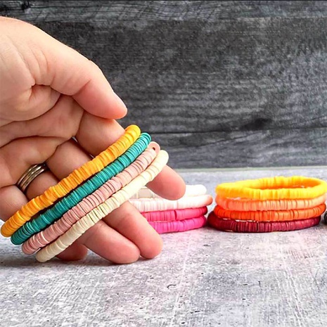 bohemian solid color clay elastic rope bracelet jewelry's discount tags