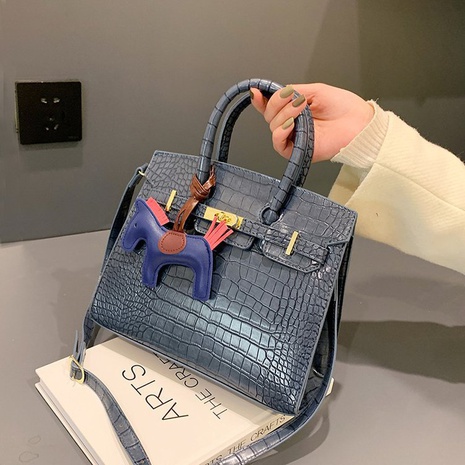 Fashion geometric stone pattern handbag shoulder bag wholesale NHTG541224's discount tags