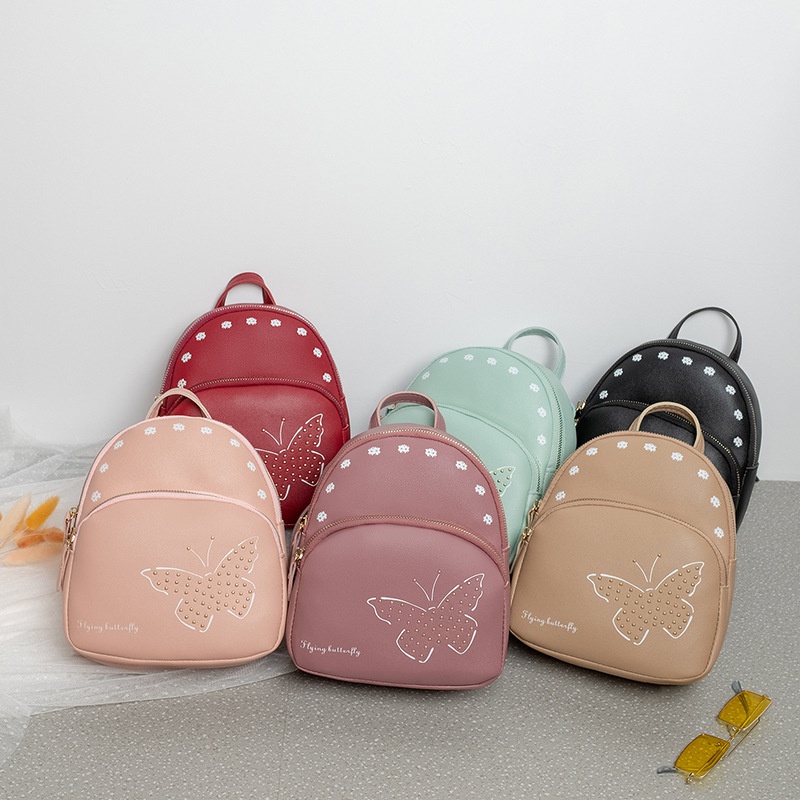 Las seoras al por mayor empaqueta la mini mochila linda del doble de la capa de la mochila del modelo de la mariposa del color puro