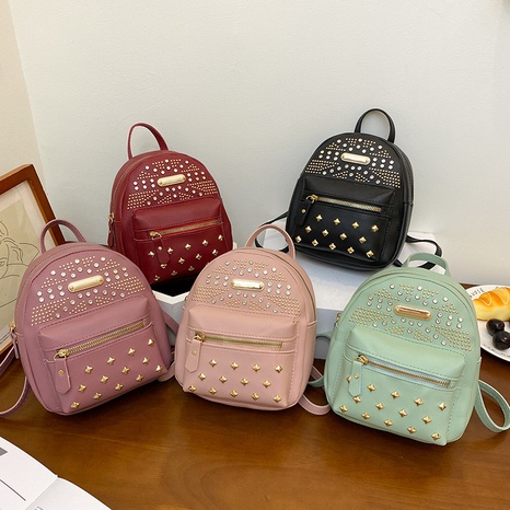 2021 autumn new product rivet bag solid color diamond-studded zipper backpack's discount tags