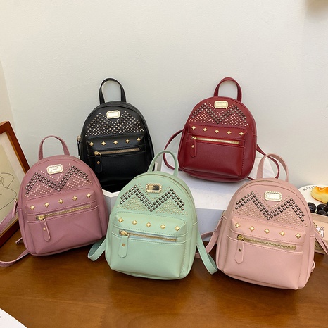 Women's backpack solid color metal rivet zipper bag simple diamond shoulder bag NHJYX541617's discount tags