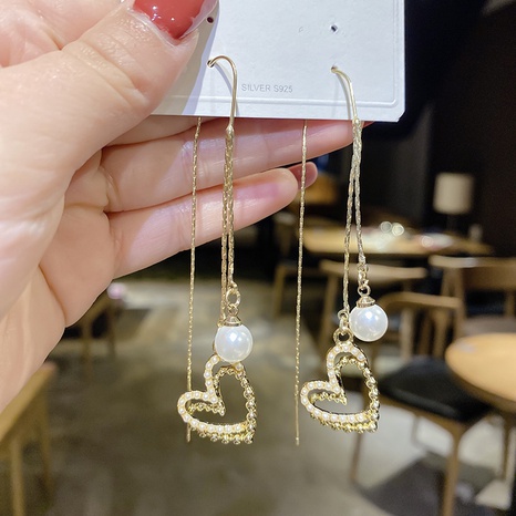 Version coréenne du pendentif perle boucles d'oreilles d'amour longues mode ligne d'oreille personnalisée's discount tags