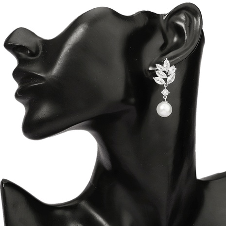 Boucles d'oreilles en zircon de banquet avec perles géométriques creuses à la mode's discount tags
