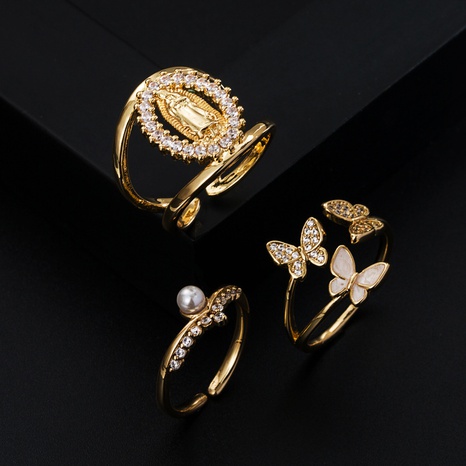 Europäische und amerikanische Mode kupfervergoldetes Lächeln Zirkon geometrischer Ring Großhandel's discount tags