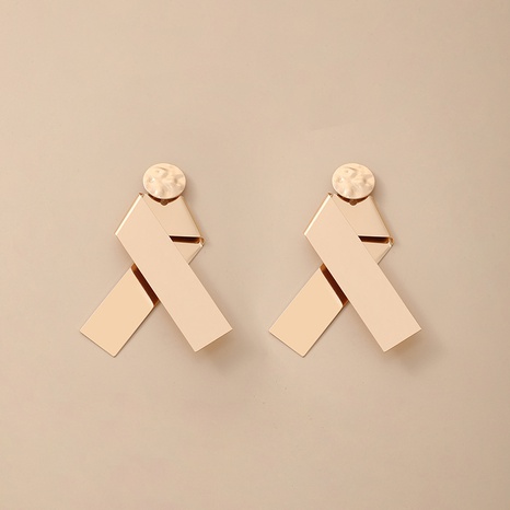 boucles d'oreilles dorées irrégulières en forme de croix géométrique en métal's discount tags