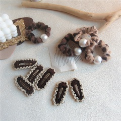 Dentelle de laine coréenne goutte d'eau géométrique motif léopard élastique en épingle à cheveux perle