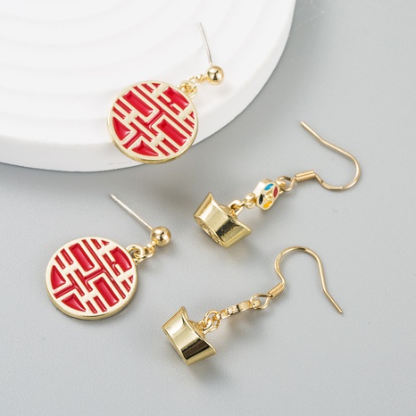 Chinese style festival gold ingot alloy drip earrings  NHLN546891's discount tags
