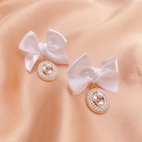 Korean retro fabric bow pearl earrings temperament fashion earrings's discount tags