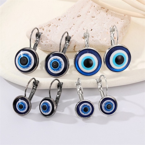 Boucles d'oreilles oeil de diable à paillettes rétro avec bordure en métal bronze et yeux bleus's discount tags