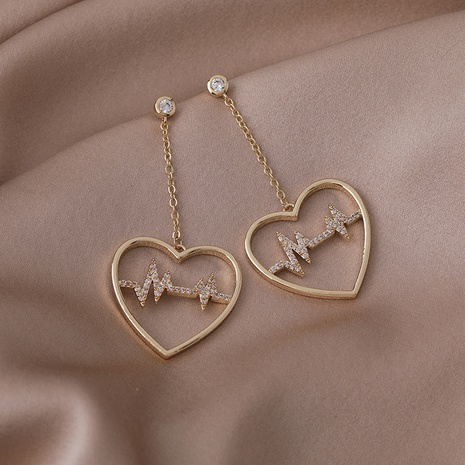 Boucles d'oreilles en cuivre à électrocardiogramme à diamants clignotants incrustés à la mode's discount tags