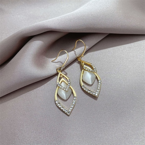 Pendientes en forma de gota de moda Ganchos para la oreja simples Pendientes de diamantes de imitación con incrustaciones's discount tags