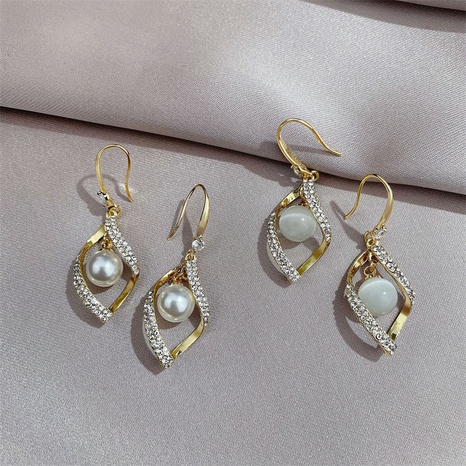 joyas pendientes de circonita perla de metal giratorio temperamento simple's discount tags