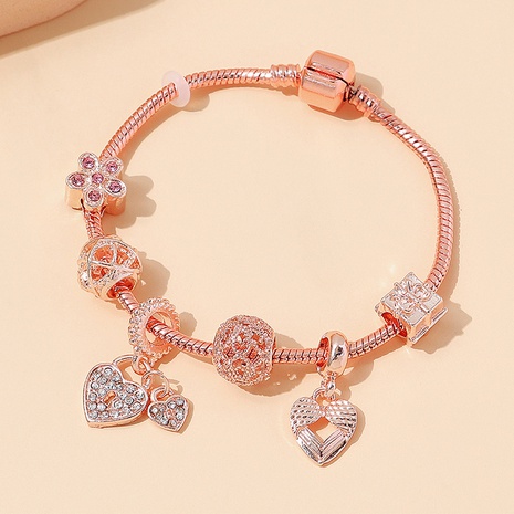 European and American creative peach heart copper rhinestone flower bracelet's discount tags