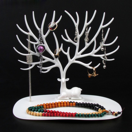 Estante de joyería creativo plástico árbol asta pendientes de uñas pulsera collar estante de almacenamiento soporte de exhibición de joyería de escritorio's discount tags