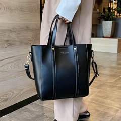 sac à bandoulière simple de couleur unie nouvelle version coréenne du sac fourre-tout portable de grande capacité messenger