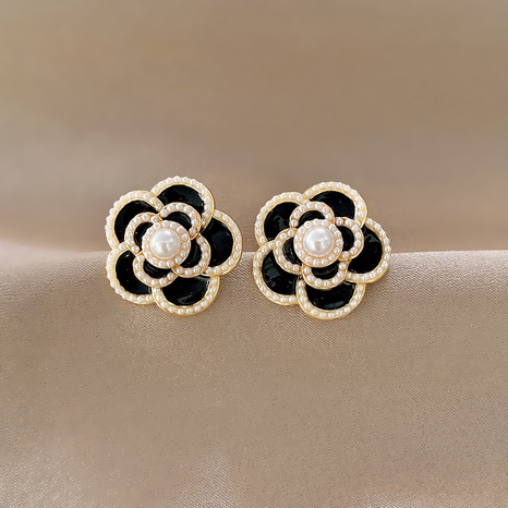 Simple fashion pearl flower earrings female niche personality trend alloy earrings's discount tags