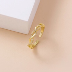 Anillo de oro de nicho europeo y americano con micro incrustaciones de anillo abierto de torsión simple al por mayor