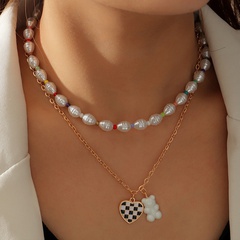 Europäische und amerikanische Perlenkette aus Metall mit Bären-Pfirsich-Herz-Anhänger-Halskette