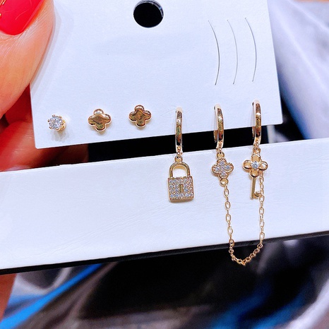 European simple fashion zircon key lock chain ear buckle studs's discount tags