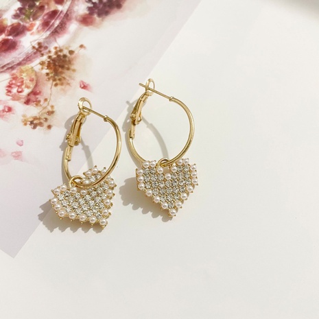 Koreanische Mode voller Diamant Pfirsich Herz Persönlichkeit Ohrringe Temperament Metallohrringe einfache Ohrringe's discount tags