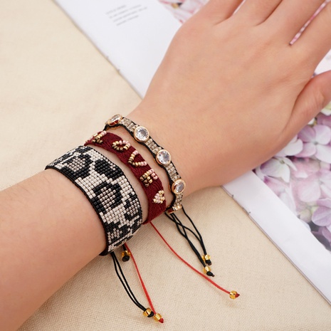 Simple leopard print beaded webbing rhinestone hand-woven bracelet's discount tags