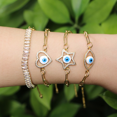 European and American fashion copper inlaid zircon palm demon eye bracelet's discount tags
