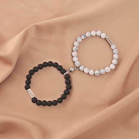 Le nouvel aimant turquoise blanc de lettrage européen et américain attire les bracelets de perles d'amoureux's discount tags