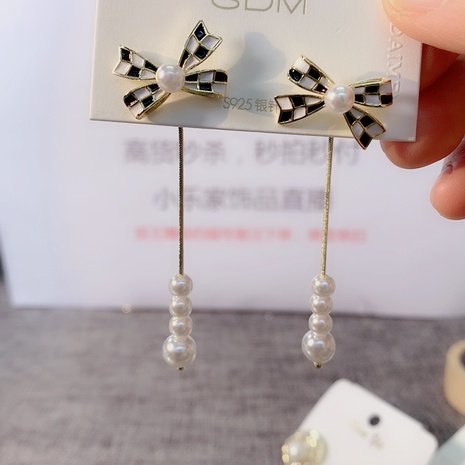 fashion bow shaped polka dot long tassel pearl alloy drop earrings's discount tags