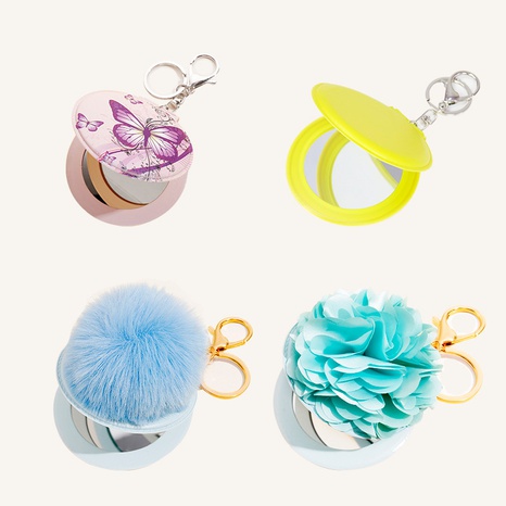 Creative portable PU multi-color mirror hair ball butterfly pattern flower shape multifunctional keychain's discount tags
