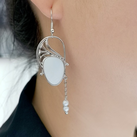 Boucles d'oreilles exagérées en forme de cygne créatif européen et américain, perles de coquille de moule's discount tags