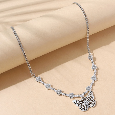 Korean retro pearl butterfly necklace wholesale's discount tags