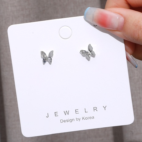 Fashion white butterfly stud earrings wholesale's discount tags