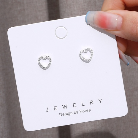Fashion hollow heart-shaped crystal stud earrings's discount tags