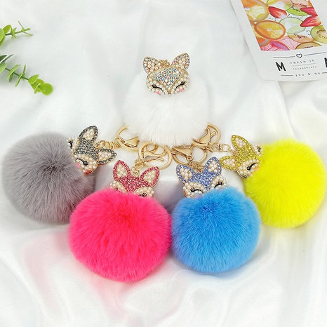 Cute mini fox fur ball fluffy pompom inlaid rhinestone bag toy key chain's discount tags