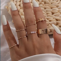2021 creative simple women's tail ring hollow butterfly three pearl ring 7-piece set