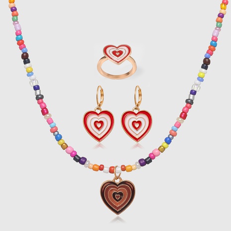 Nueva venta al por mayor gota nectarina corazón collar pendientes anillo conjunto de joyas conjunto de 3 piezas's discount tags