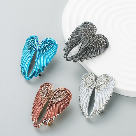 Personality angel wings brooch female Korean enamel alloy diamond brooch's discount tags