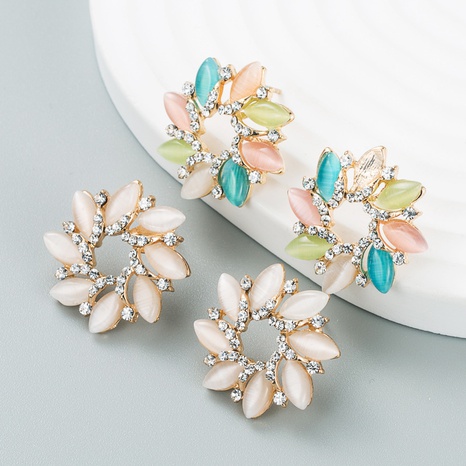 Korean ear clip creative alloy inlaid rhinestone color flower earrings's discount tags